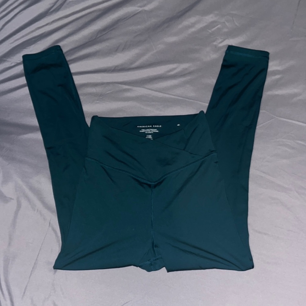 Lightly worn aerie cross over leggings , blue/green